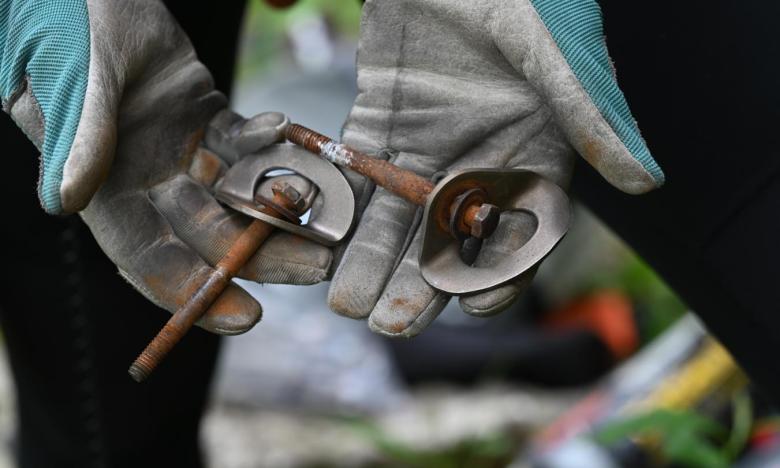 Close-up of retired climbing hardware. Photo by Kirk Jordan.